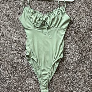 Green bodysuit